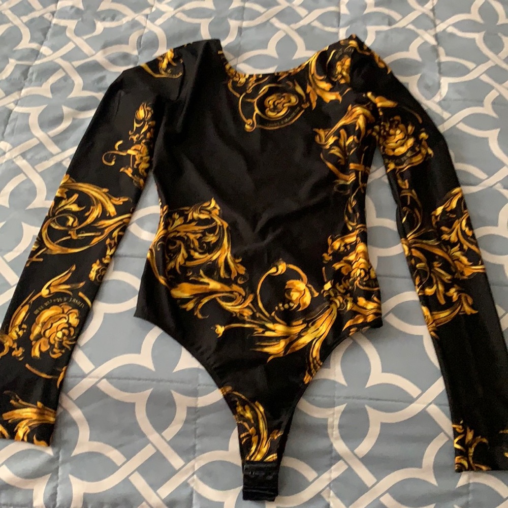New without tag.. I only tried it on.. The bodysuit is not for me